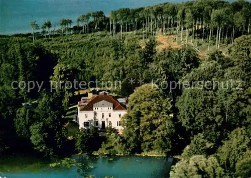 AK / Ansichtskarte Daenisch Nienhof Hotel Restaurant Schloss am Meer Fliegeraufnahme Daenisch Nienhof