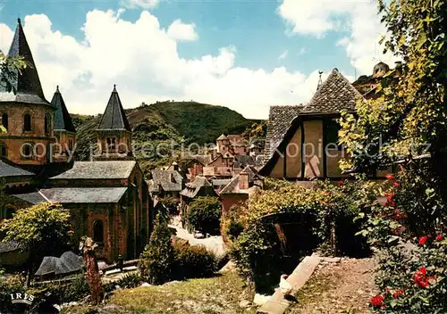 AK / Ansichtskarte Conques_en_Rouergue_Pyrenees_Region Eglise Sainte Foy Vieilles Maisons Toits de Lauzes  Conques_en