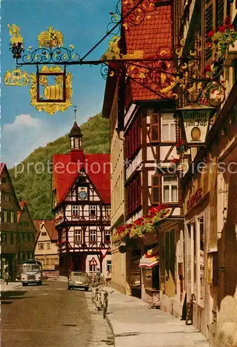 AK / Ansichtskarte Bad_Urach Wilhelmstrasse mit Rathaus Tuerschild Gasthof Altstadt Fachwerkhaeuser Bad_Urach