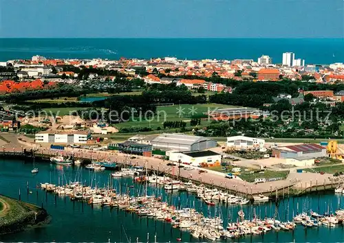 AK / Ansichtskarte Norderney_Nordseebad Fliegeraufnahme mit Jachthafen und Stadt Norderney_Nordseebad