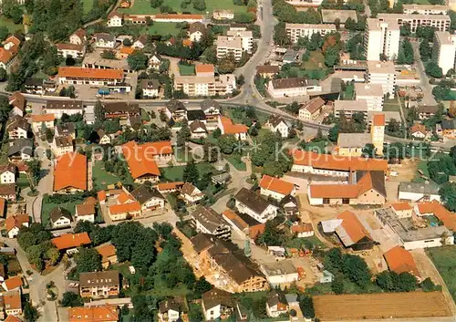 AK / Ansichtskarte Unterhaching Pfarrkirche und Pfarrheim St. Korbinian Fliegeraufnahme Unterhaching