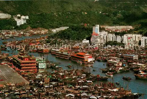 Hong_Kong Floating Seafood Restaurants Junks and Sampans densely moored at the Harbour Air view Hong_Kong