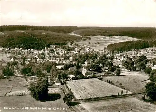 AK / Ansichtskarte Neuhaus_Solling Fliegeraufnahme mit Hotel Cafe Schatte und Gaestehaus Haus Enzian Neuhaus Solling