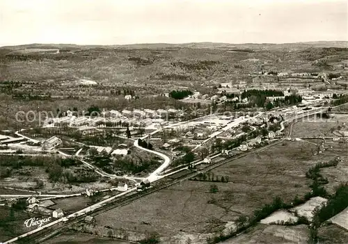 AK / Ansichtskarte La_Courtine Vue generale aerienne du Camp Au fond la Chaine des Monts d Auvergne La_Courtine