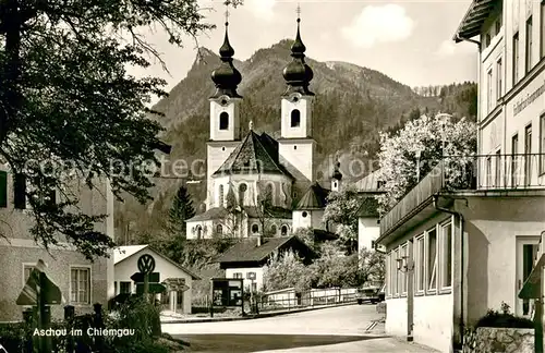 AK / Ansichtskarte Aschau_Chiemgau Ortsmotiv mit Kirche Aschau Chiemgau