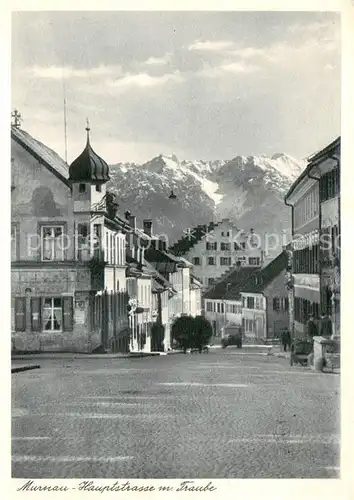 AK / Ansichtskarte Murnau_Staffelsee Hauptstrasse mit Gasthaus Traube Murnau_Staffelsee