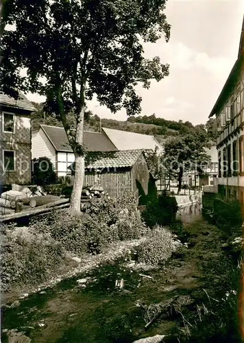 Lauenberg Gasthaus Zum Sollinger Wald Haeuserpartie am Bach Lauenberg