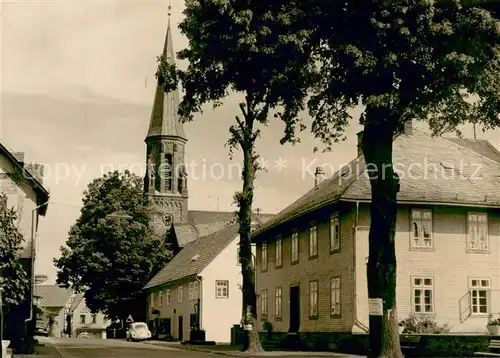 AK / Ansichtskarte Ulrichstein Ortspartie mit Kirche Ulrichstein