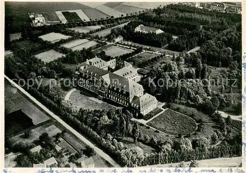 AK / Ansichtskarte Puetzchen Fliegeraufnahme Herz Jesu Kloster Puetzchen