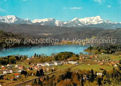 AK / Ansichtskarte Krumpendorf_Woerthersee mit Karawanken Mittagskogel Fliegeraufnahme Krumpendorf Woerthersee