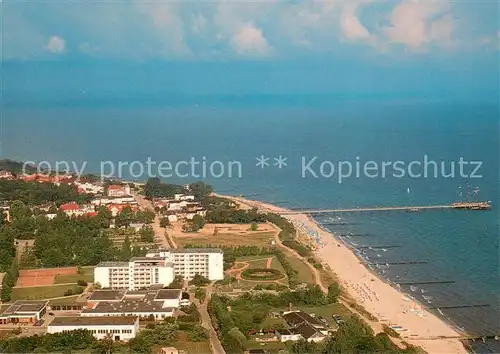 AK / Ansichtskarte Kuehlungsborn_Ostseebad Fliegeraufnahme mit Seebruecke und Skan Tours Hotel Kuehlungsborn_Ostseebad