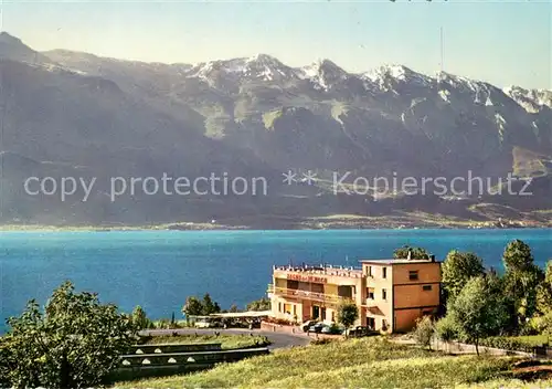 AK / Ansichtskarte Gardasee_Lago_di_Garda Blick von der Gardasee Westuferstrasse bei Limone mit Malcesine und dem Monte Baldo Gardasee_Lago_di_Garda