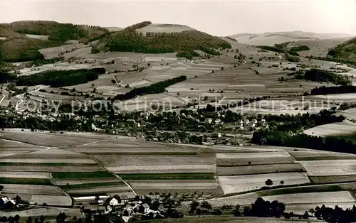 AK / Ansichtskarte Gersfeld_Rhoen Fliegeraufnahme mit Simmelsberg und Teufelsberg Gersfeld Rhoen