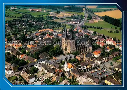 AK / Ansichtskarte Xanten Stadtblick Roemisches Amphitheater Kirche Fliegeraufnahme Xanten