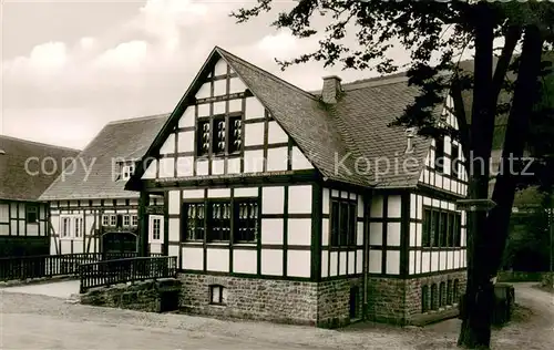 AK / Ansichtskarte Grafschaft_Schmallenberg Cafe und Kellerwirtschaft Fachwerkhaus 