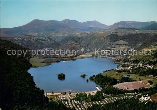 AK / Ansichtskarte Lac_Chambon La plage Camping et au fond la chaine du Sancy vue aerienne 