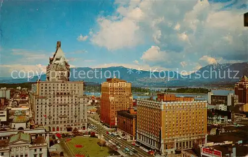 AK / Ansichtskarte Vancouver_BC_Canada View of Vancouvers business section Stanley Park North Shore mountains 