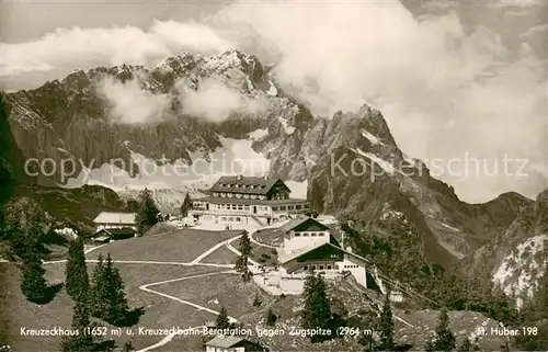 AK / Ansichtskarte Kreuzeckhaus mit Kreuzeck Bergstation und Zugspitze Kreuzeckhaus