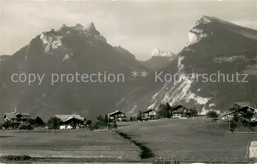 AK / Ansichtskarte Aeschi_BE Haeusergruppe mit Rothorn Sichel 7 Hengste und Niederhorn Aeschi_BE