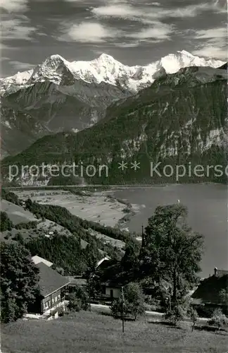 AK / Ansichtskarte Beatenberg_BE Kirche mit Thunersee Eiger Moench Jungfrau 