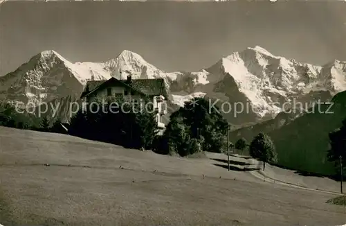 AK / Ansichtskarte Beatenberg_BE Amisbuehl Hotel Pension m. Eiger Moench Jungfrau   Bergpanorama 