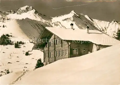 AK / Ansichtskarte Achseten Ferienheim Weid Aussenansicht Winter Schnee Niesenkette Achseten