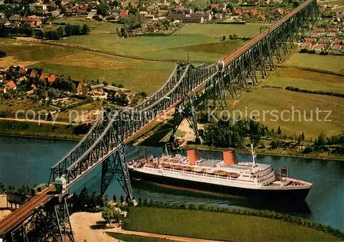 AK / Ansichtskarte Rendsburg Hochbruecke ueber den Nord Ostsee Kanal Fliegeraufnahme Rendsburg