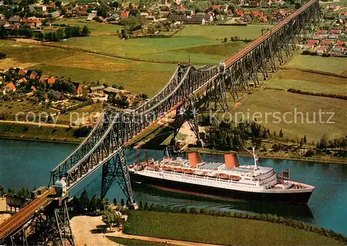 AK / Ansichtskarte Rendsburg Hochbruecke ueber den Nord Ostsee Kanal Dampfer Fliegeraufnahme Rendsburg