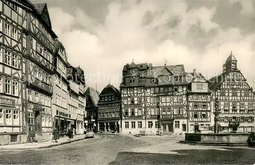 AK / Ansichtskarte Butzbach Marktplatz Brunnen Altstadt Fachwerkhaeuser Butzbach