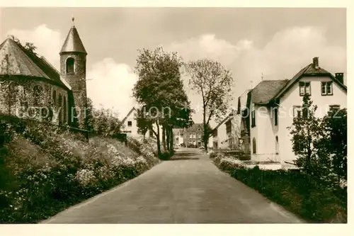 AK / Ansichtskarte Juenkerath Strassenpartie mit Kirche Juenkerath