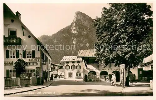 AK / Ansichtskarte Oberammergau Am Dorfplatz Oberammergau