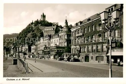 AK / Ansichtskarte Cochem_Mosel Ortspartie mit Burg Cochem Mosel