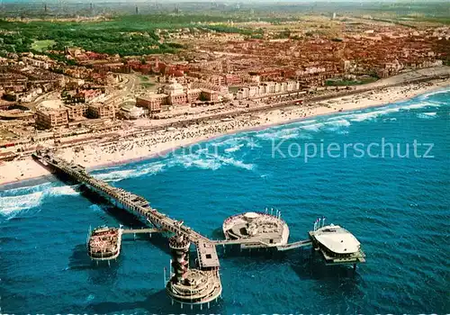 AK / Ansichtskarte Scheveningen Fliegeraufnahme Pier u. Strand Scheveningen