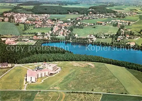 AK / Ansichtskarte Guenne_Moehnesee Heinrich Luebcke Haus der KAB mit Ausgleichsweiher der Moehnetalsperre Fliegeraufnahme Guenne Moehnesee