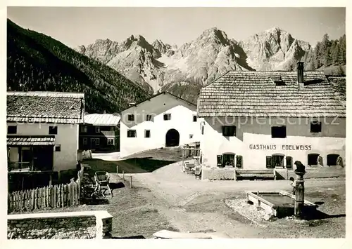 AK / Ansichtskarte Scarl Dorfbrunnen Gasthaus Edelweiss Scarl