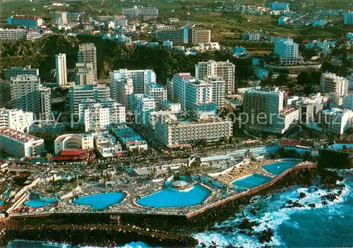 AK / Ansichtskarte Puerto de la Cruz_Tenerife_ES Fliegeraufnahme von Schwimmbaedern und Hotels 