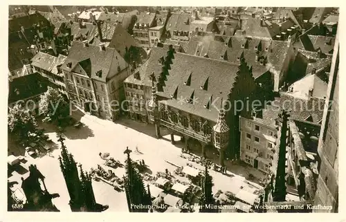 AK / Ansichtskarte Freiburg_Breisgau Blick vom Muensterturm auf Wochenmarkt und Kaufhaus Freiburg Breisgau