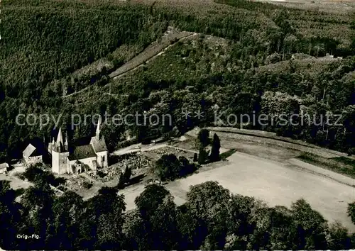 AK / Ansichtskarte Muenchhausen_Christenberg Fliegeraufnahme Kirche Muenchhausen_Christenberg