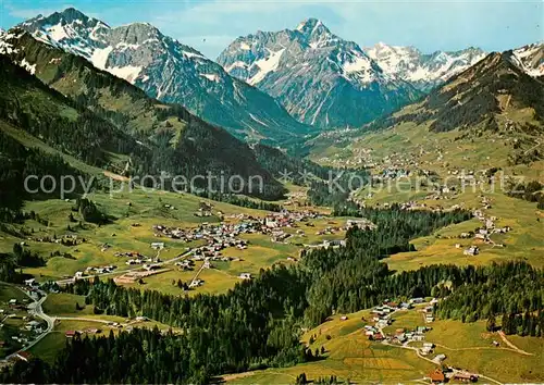 AK / Ansichtskarte Kleinwalsertal Fliegeraufnahme mit Riezlern Hirschegg und Mittelsberg Kleinwalsertal