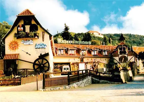 AK / Ansichtskarte Gernrode_Harz Harzer Uhrenfabrik mit Riesenkuckucksuhr Gernrode Harz