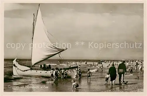 AK / Ansichtskarte Noordwyk_aan_Zee_Noordwijk_NL Strandleben Segelboot 