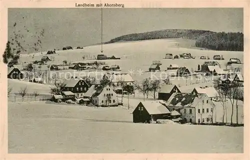 AK / Ansichtskarte 73801716 Heidelberg_Erzgebirge Ortsansicht mit Landheim mit Ahornberg Winterlandschaft Heidelberg Erzgebirge