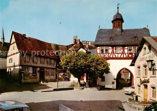 AK / Ansichtskarte 73811599 Koenigstein__Taunus Motiv am alten Rathaus Altstadt Gasthaus Torbogen 