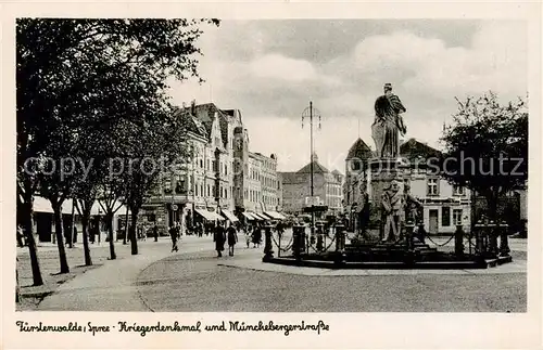 AK / Ansichtskarte 73821367 Fuerstenwalde_Spree Kriegerdenkmal und Muenchebergerstrasse Fuerstenwalde_Spree