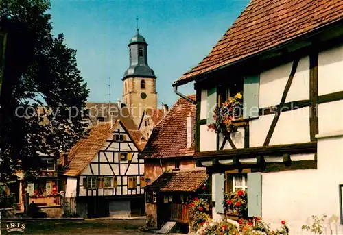 AK / Ansichtskarte Bouxwiller_Saverne Maisons alsaciennes et l eglise Bouxwiller_Saverne