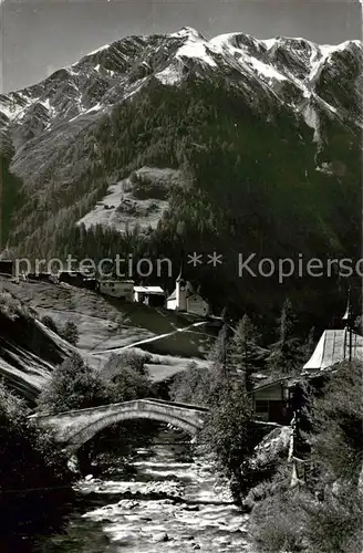 AK / Ansichtskarte Binn mit Breithorn Kirche und Bruecke ueber die Binna Binn