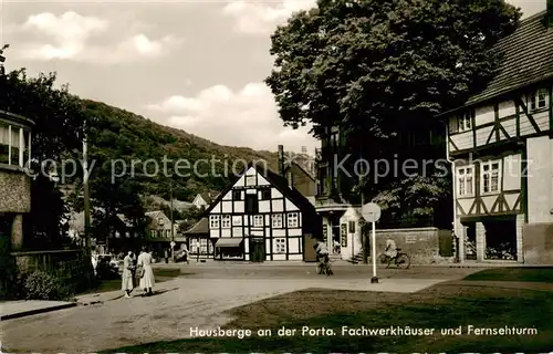 AK / Ansichtskarte 73831687 Hausberge_Porta_Westfalica Fachwerkhaeuser und Fernsehturm 