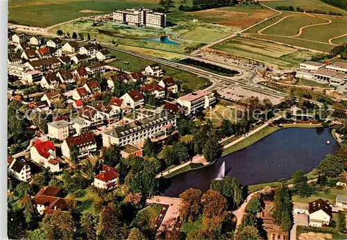 AK / Ansichtskarte 73832648 Bad_Meinberg Kurparksee und Sanatorien Kurklinik am Park mit Bewegungszentrum Bad_Meinberg