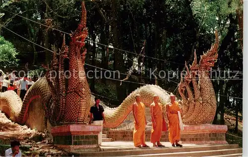 AK / Ansichtskarte Chiang_Mai_Thailand Three Buddhists monks post on ground floor of the staircase flanked by Naga Serpentking balastrades of Wat Phrathat 