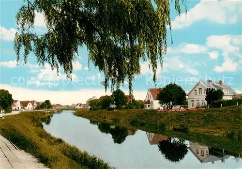 AK / Ansichtskarte 73851475 Carolinensiel_Ostfriesland Uferpartie am Kanal Carolinensiel